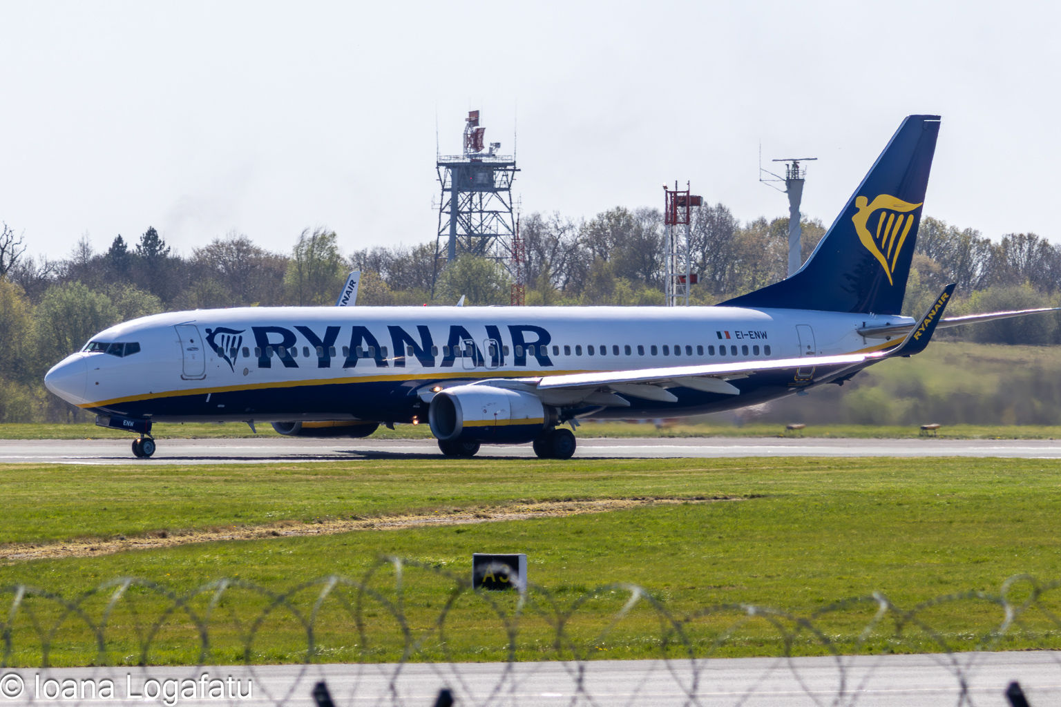 Jet taxiing on sunny runway
